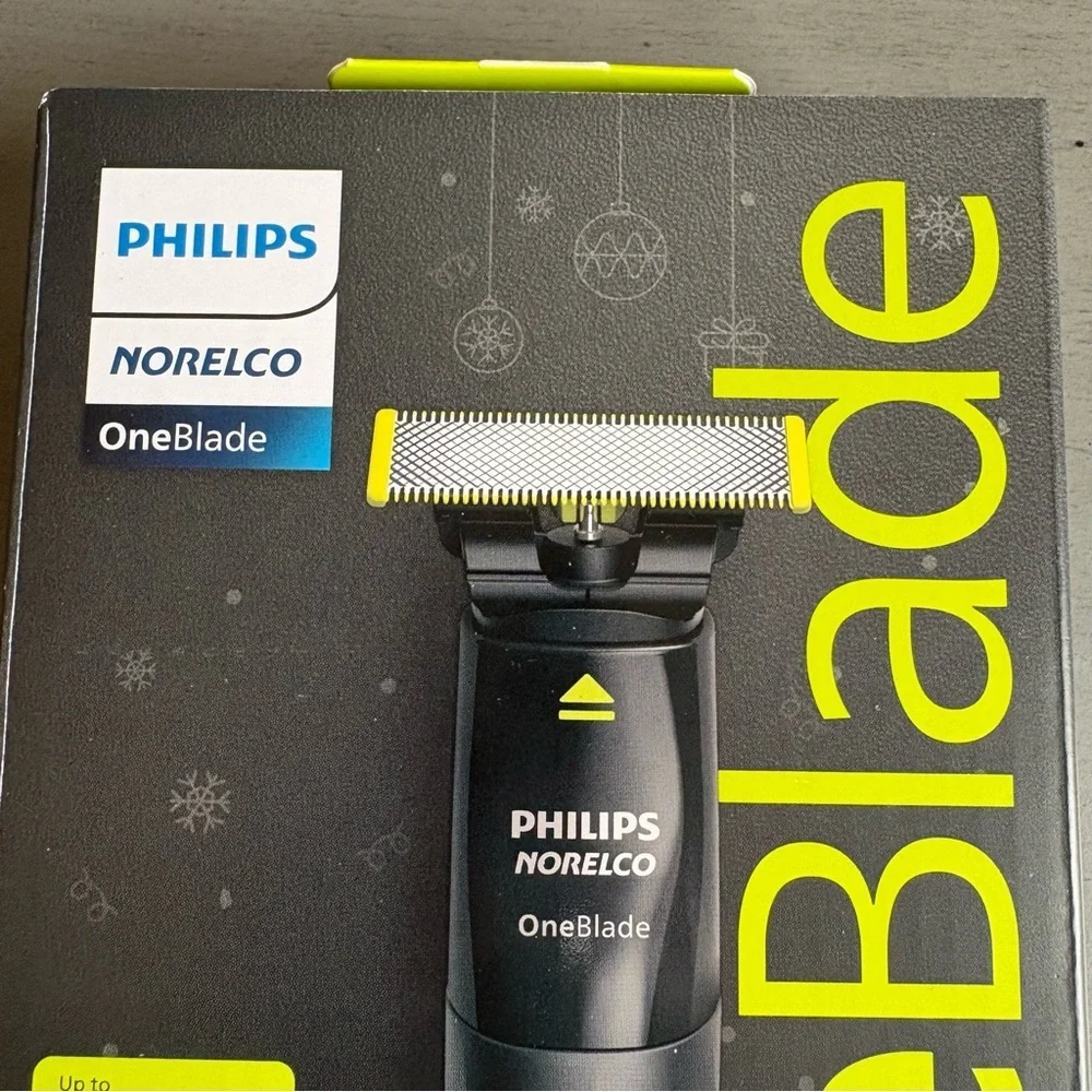 Philips Norelco OneBlade Razor - Trim, Edge & Shave - 1 Blade - 2 Combs Wet/Dry